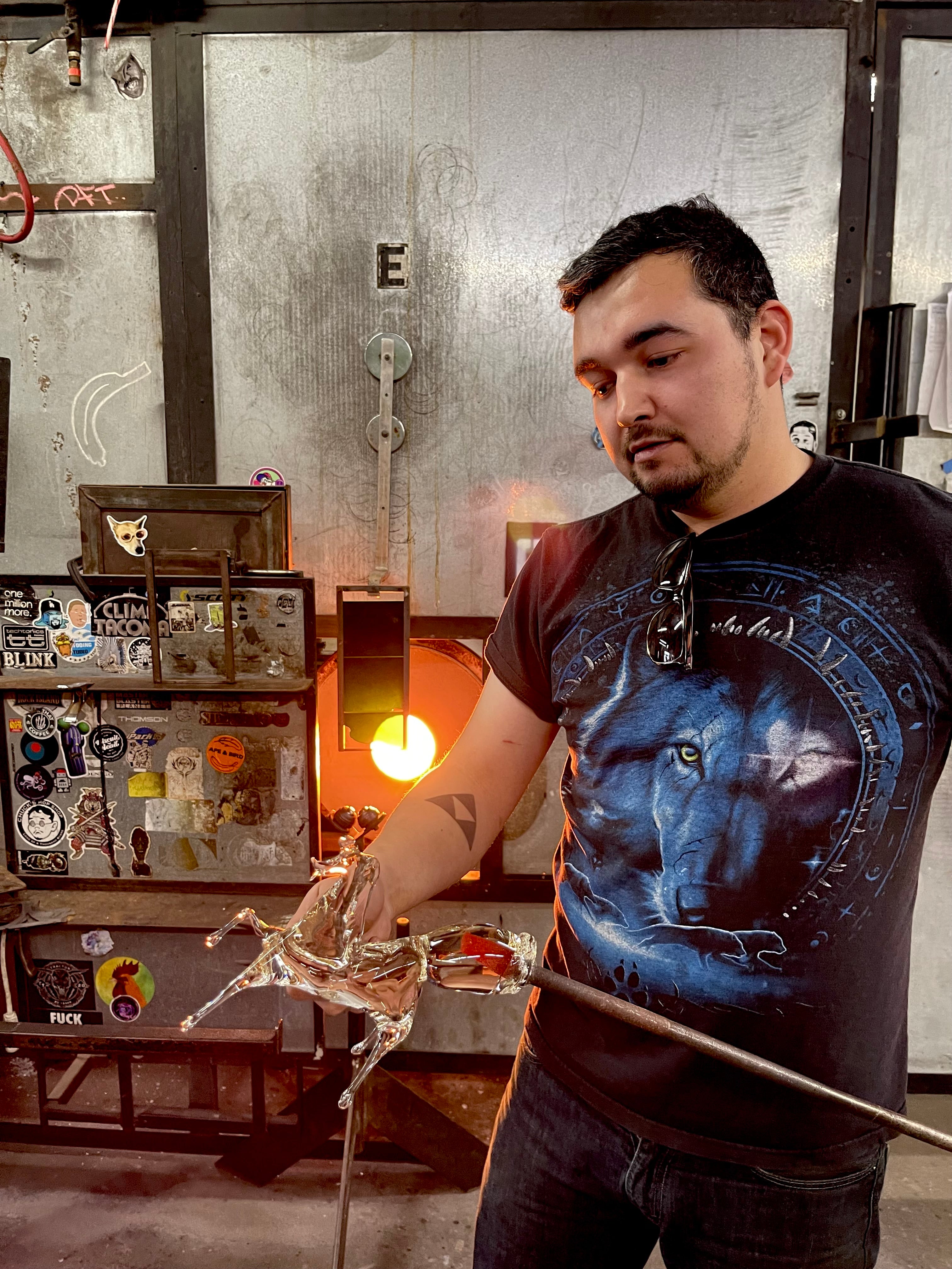 glassybaby glassblower Jeremy in a hot shop creating one of his unique hand-blow glass art pieces.