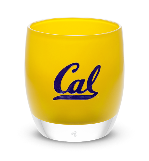 Cal Berkeley, University of California, Berkeley logo etched in navy blue onto a yellow, hand-blown glass votive candle holder.