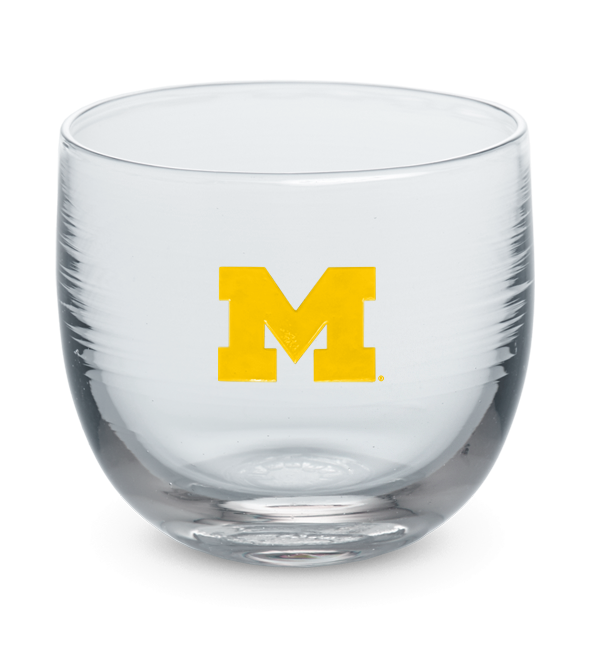 Michigan drinker, clear hand-blown lowball drinking glass with University of Michigan hand-etched in yellow.