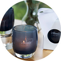 three custom alaska airlines votive with company logo hand-etched on with acrylic baby stand and glassybaby gift wrapping.