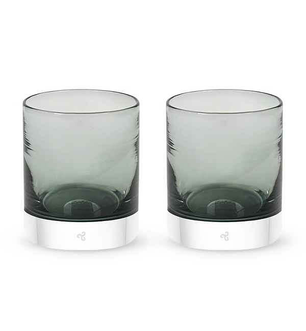 two Dusk and Dawn rockers, dark gray hand-blown glass lowball drinking glasses.