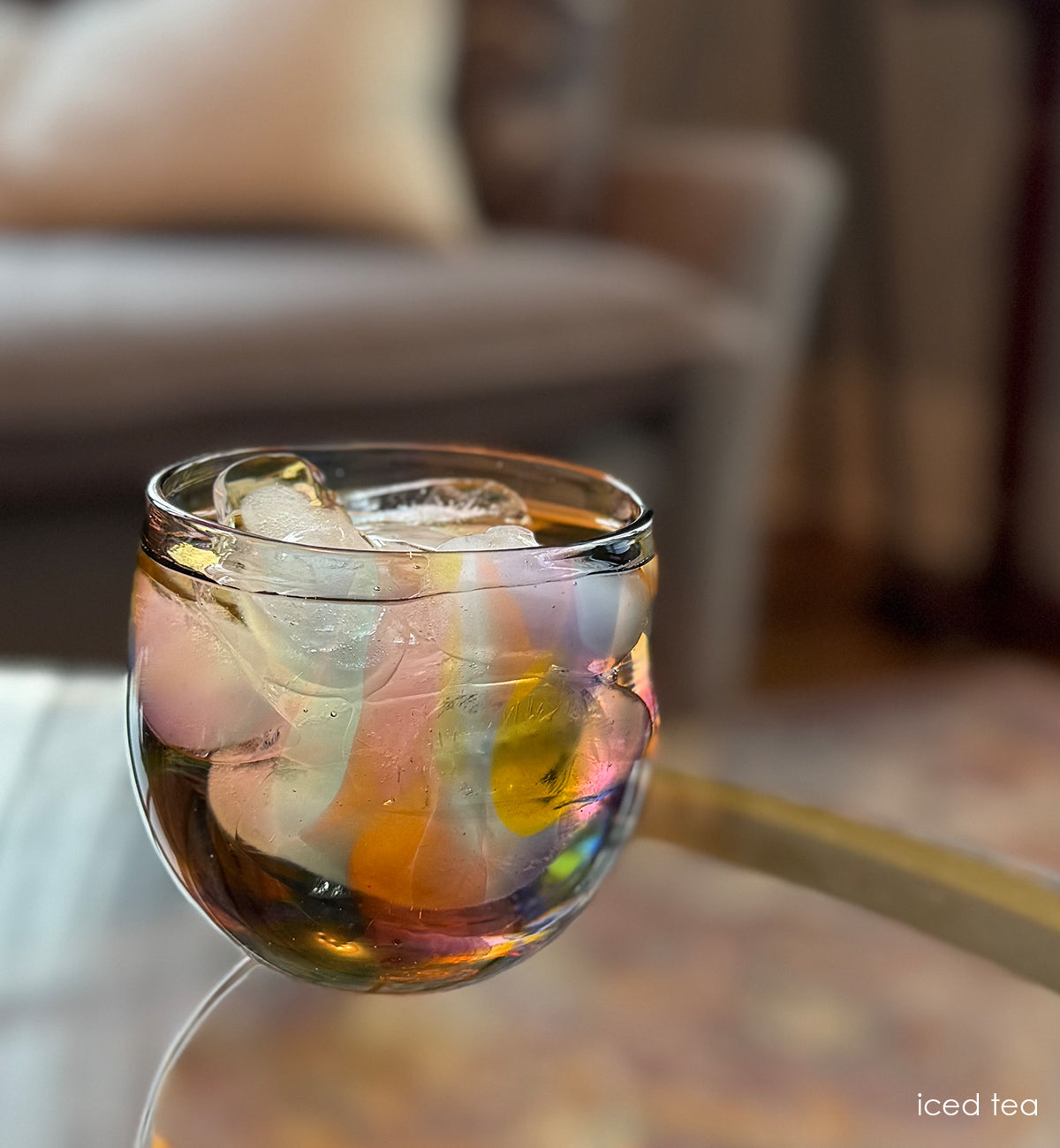 iced tea, multi-colored hand-blown drinking glass.