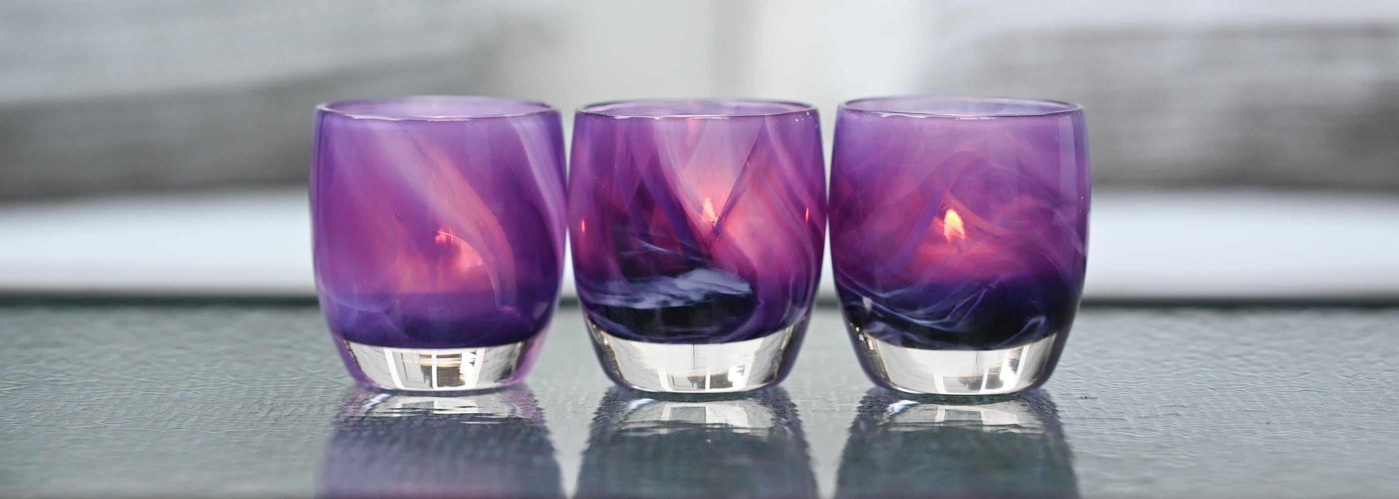 'in real life' purple hand-blown glass candle holder