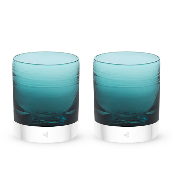 two Ocean Wave rockers, teal blue transparent hand-blown lowball drinking glasses.