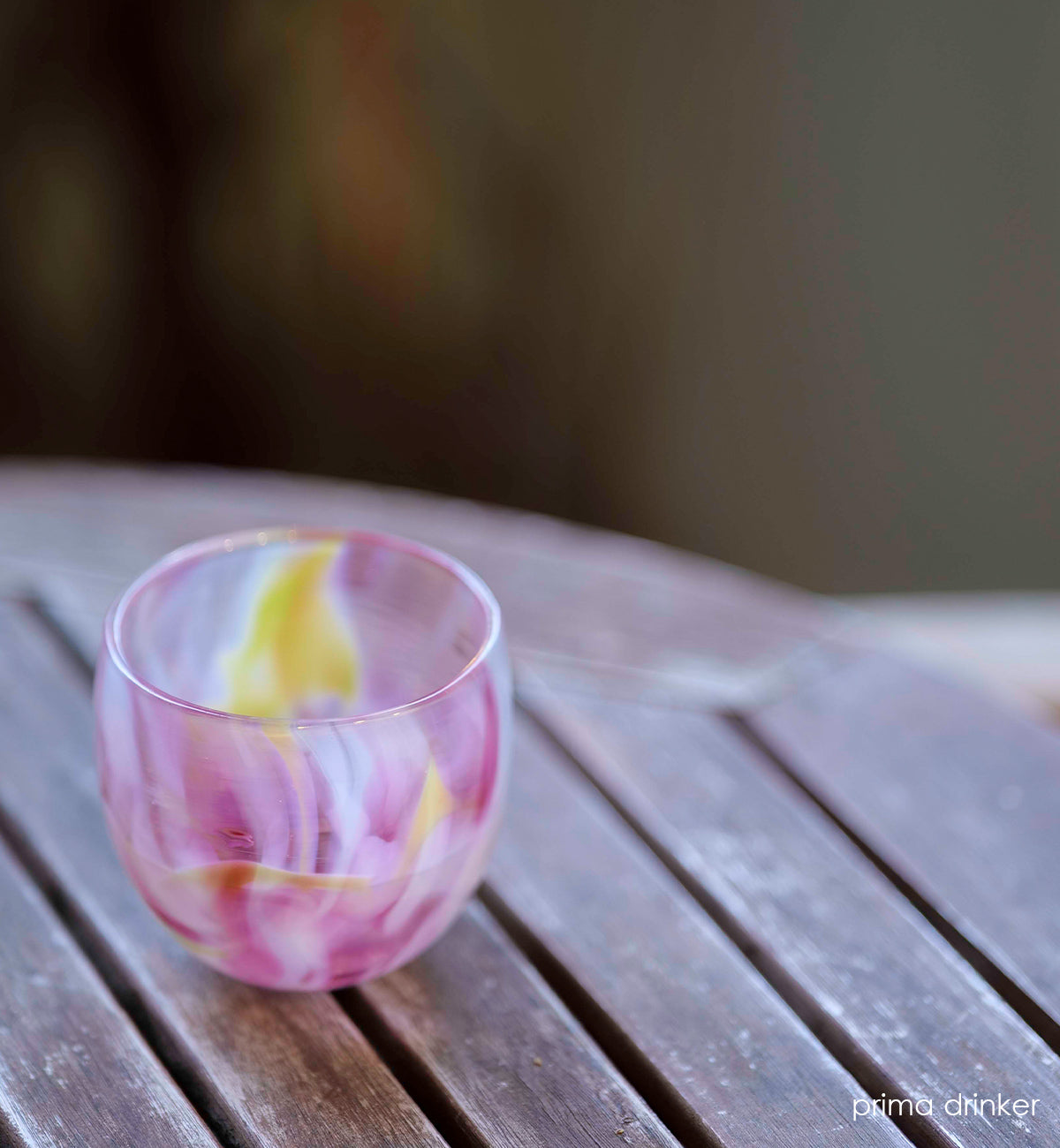 prima pink multi-colored petal, hand-blown drinking glass.