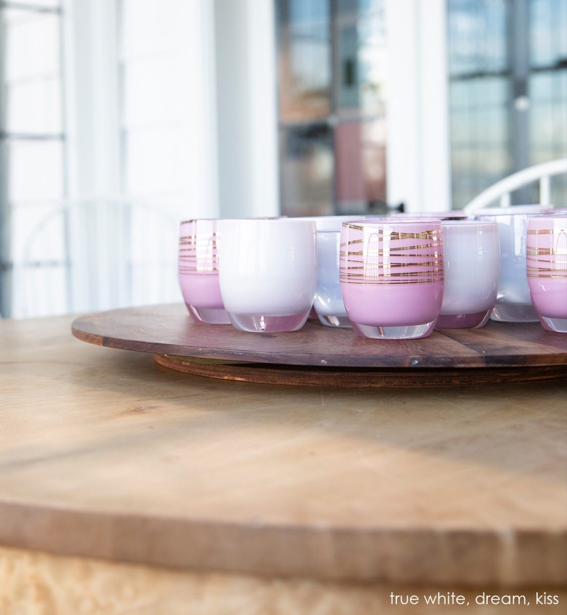 kiss pink with gold wrap hand-blown glass votive candle holder. Paired with dream and true white.