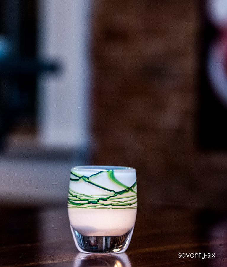 seventy six, white with blue green webbing on top, hand-blown glass votive candle holder